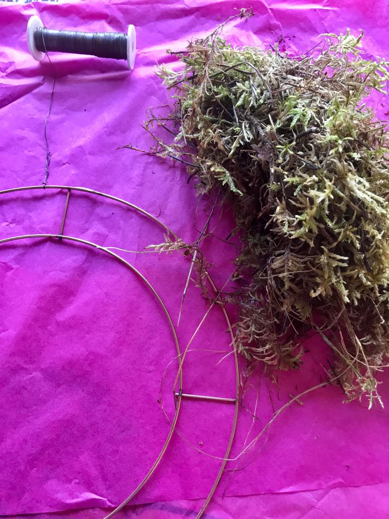 Gather some moss into a fat sausage shape